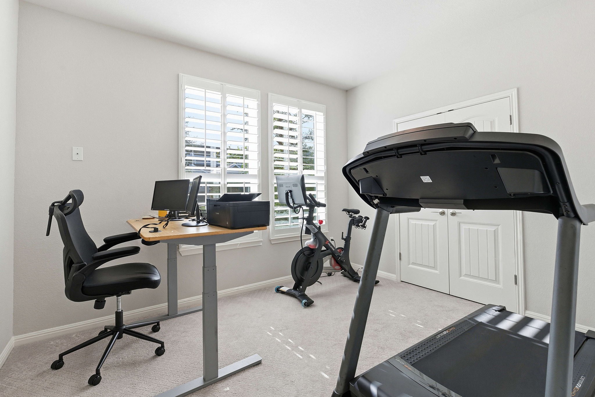 5720 Baythorne Drive Austin, TX 78747 - Photo 11 of 19 a view of a workspace with furniture and a window