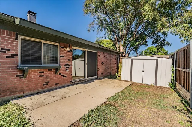 a front view of a house with a garage