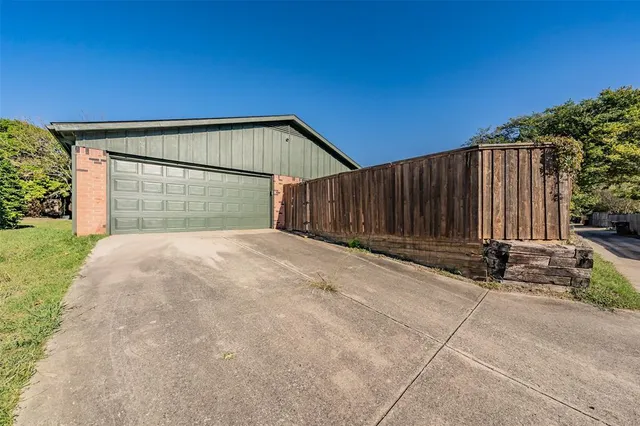 a view of backyard with green space