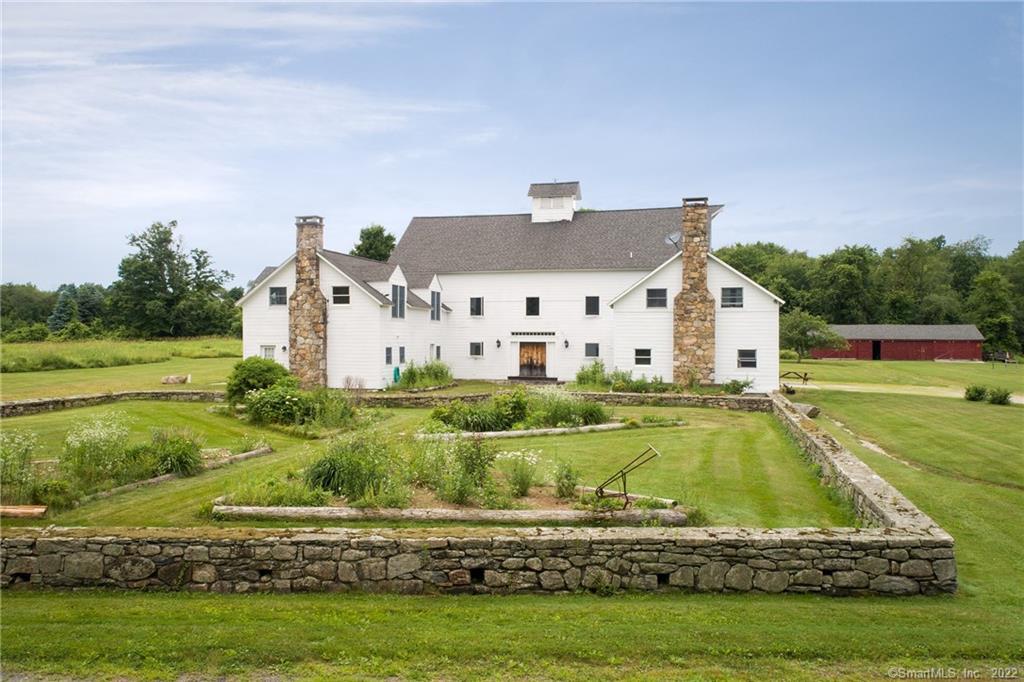 76 Swaller Hill Road Sharon, CT 06796 - Photo 1 of 1 a view of a house with a big yard