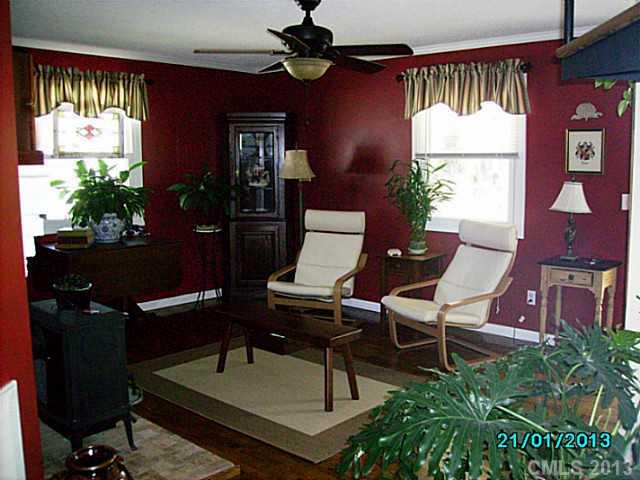 7680 Stokes Ferry Road Salisbury, NC 28146 - Photo 2 of 16 a workspace with furniture and window