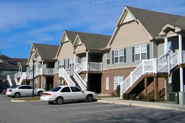 a car parked in front of a house