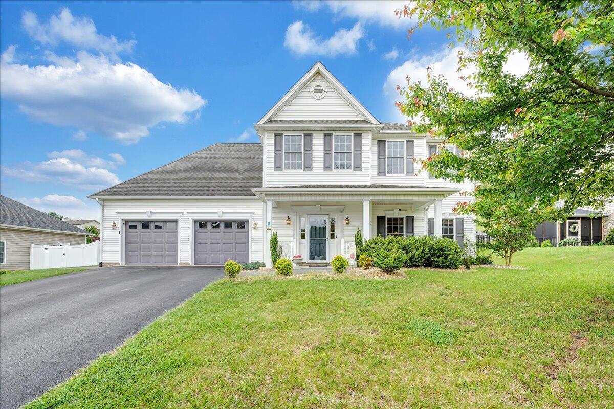 5924 Crumpacker Drive Roanoke, VA 24012 - Photo 1 of 1 a front view of a house with a yard and potted plants