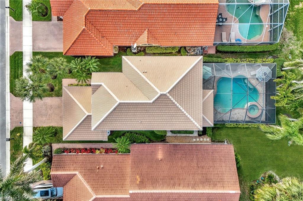 1614 Triangle Palm Terrace Naples, FL 34119 - Photo 24 of 40 an aerial view of a house
