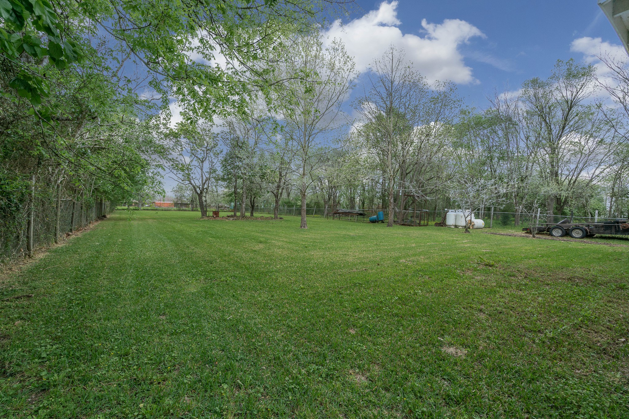 3409 Herbert Pearland, TX 77584 - Photo 14 of 17 a backyard of apartments with large trees