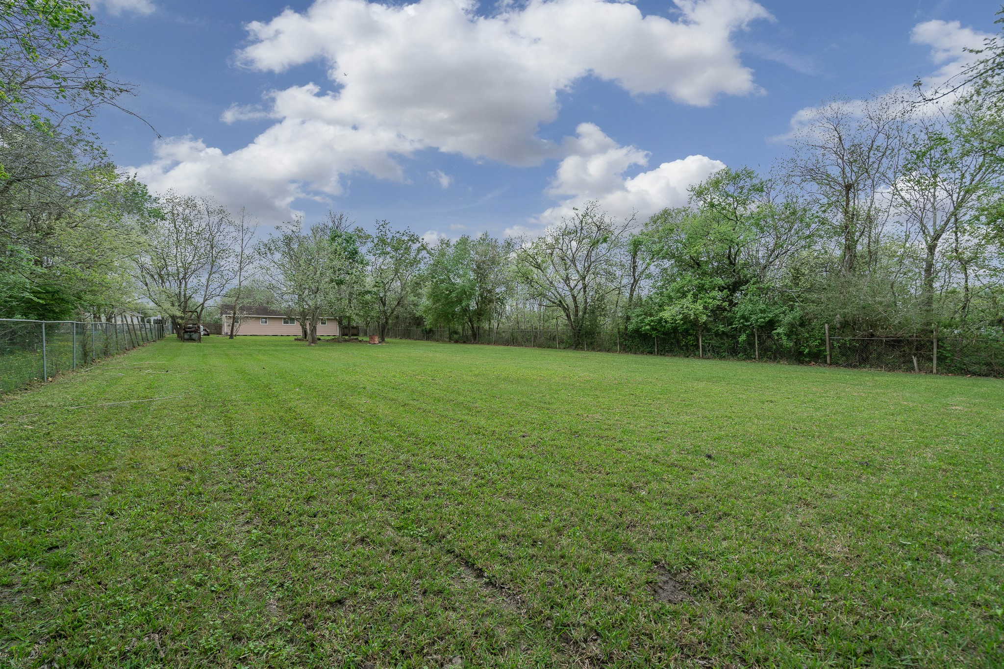 3409 Herbert Pearland, TX 77584 - Photo 16 of 17 a view of a grassy field