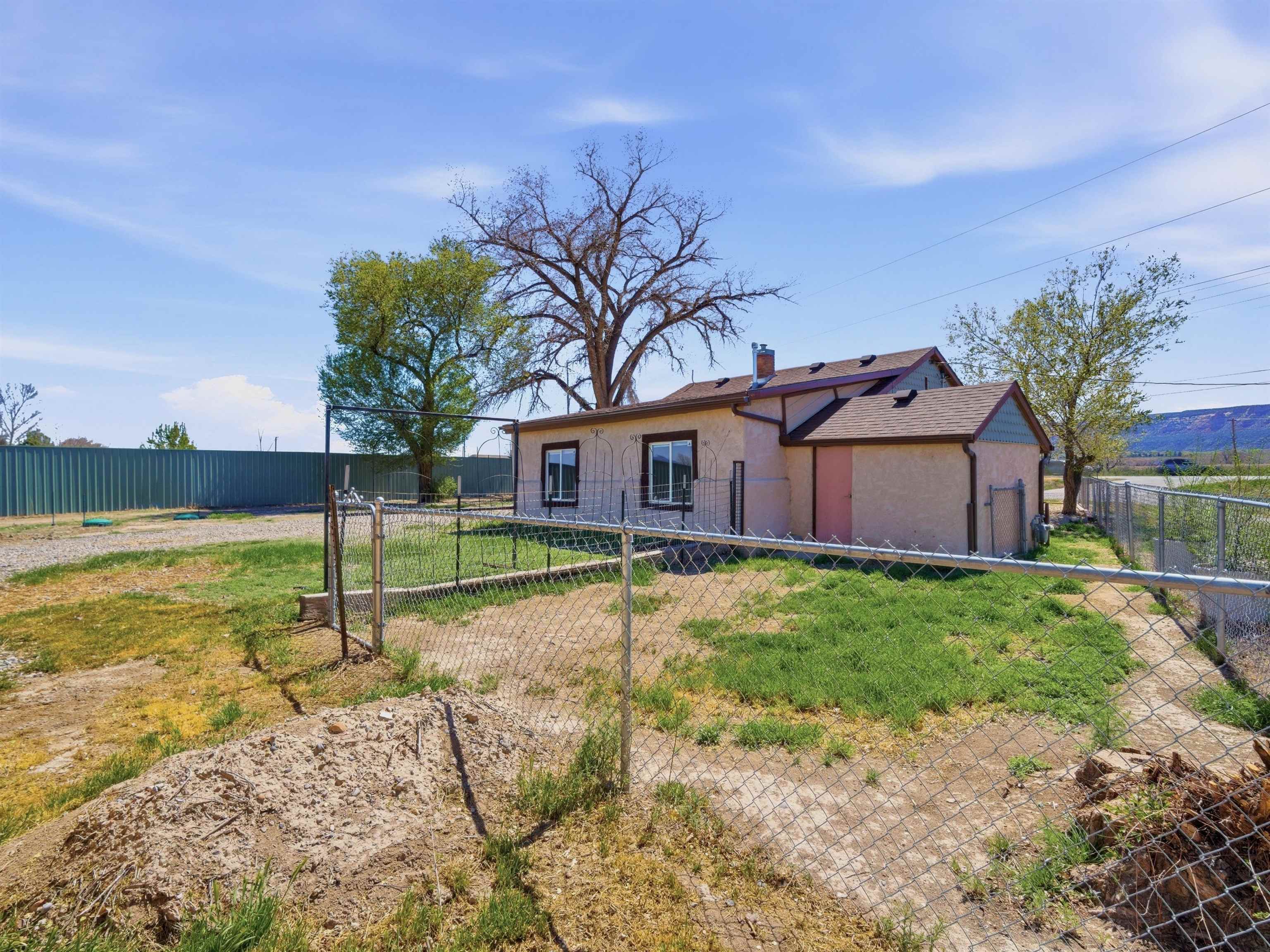 333 Highway 6 And 50 Fruita, CO 81521 - Photo 22 of 36 a view of a house with garden