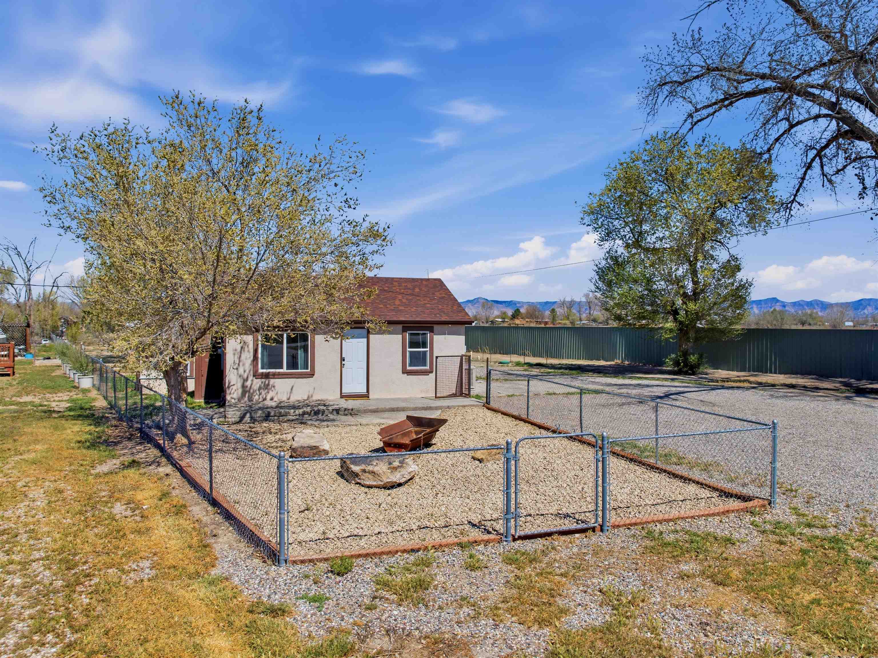 333 Highway 6 And 50 Fruita, CO 81521 - Photo 3 of 36 a view of a house with backyard and sitting area
