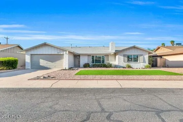 front view of house with a yard