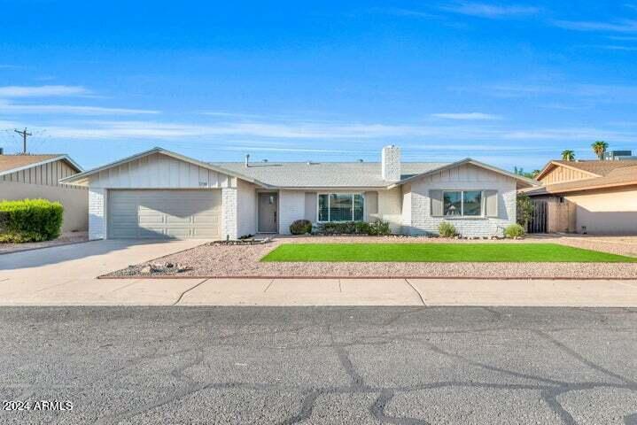 1734 East Laguna Drive Tempe, AZ 85282 - Photo 1 of 23 front view of house with a yard