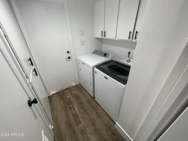 a utility room with dryer and washer