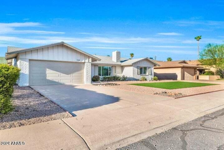1734 East Laguna Drive Tempe, AZ 85282 - Photo 2 of 23 front view of house with a yard