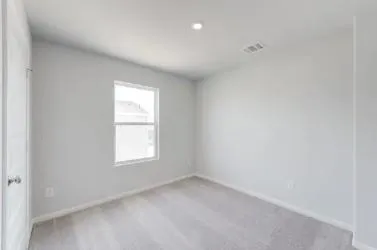 an empty room with window