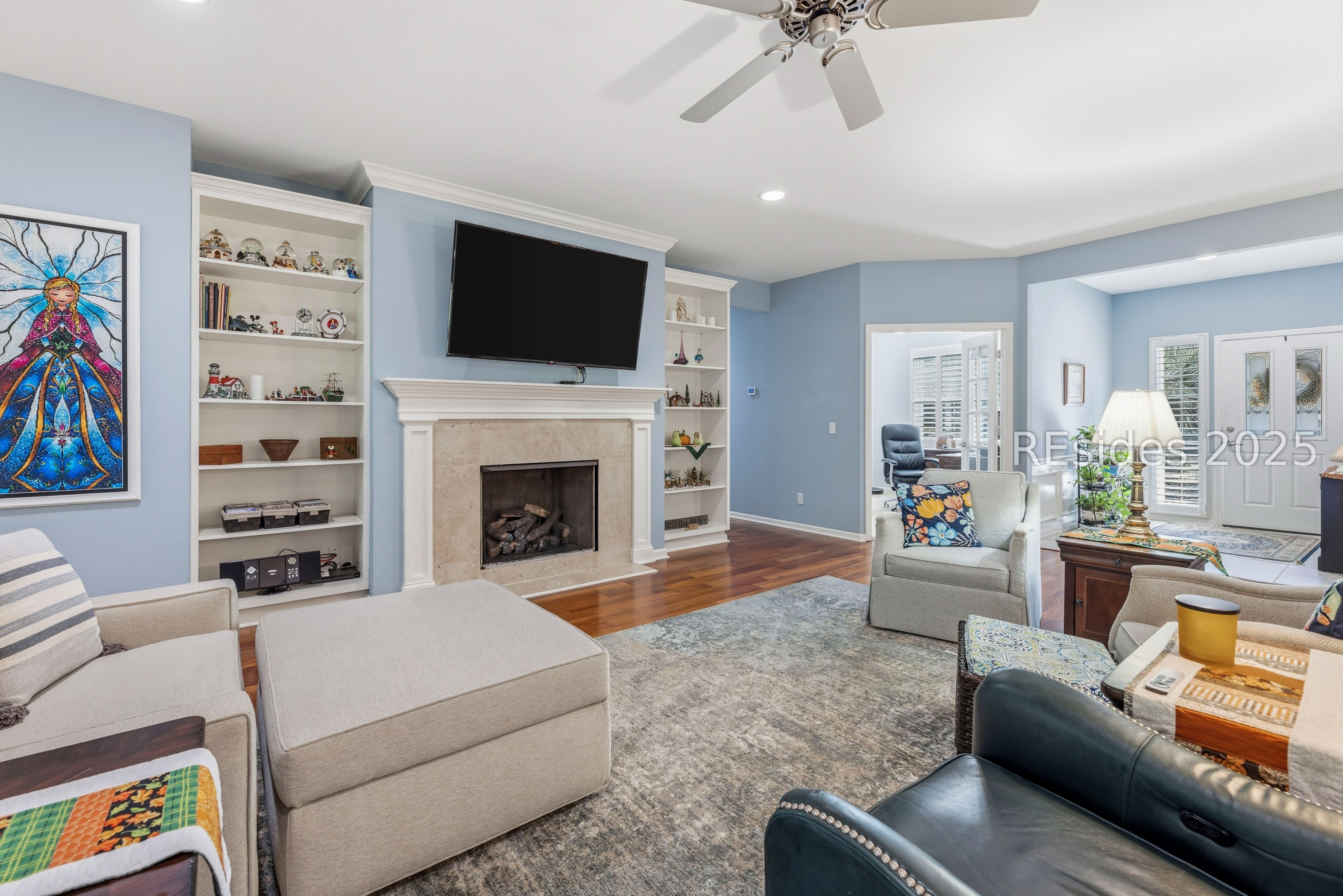 10 Fairforest Lane Bluffton, SC 29909 - Photo 11 of 46 Living area with built ins and gas fireplace