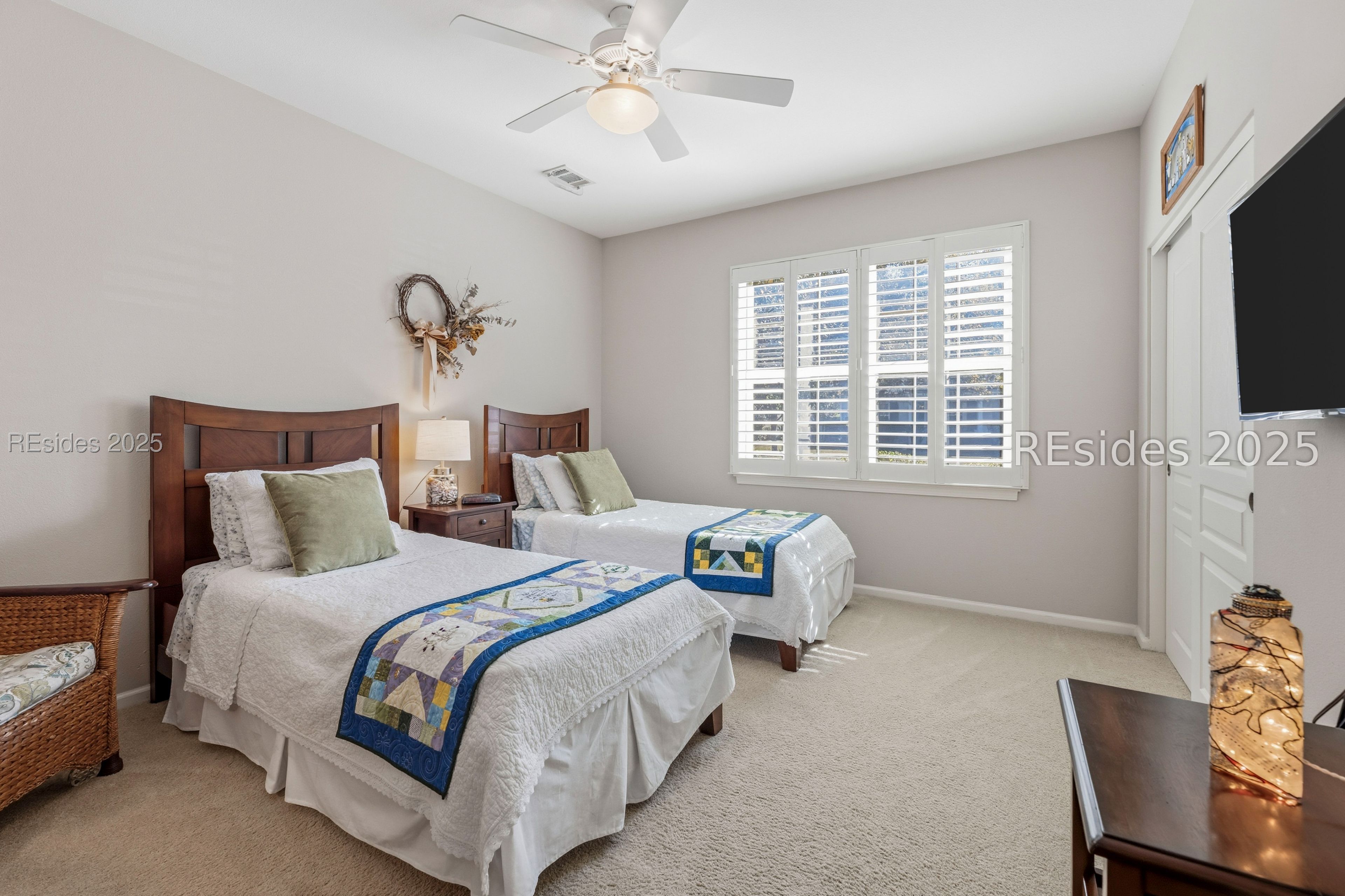 10 Fairforest Lane Bluffton, SC 29909 - Photo 27 of 46 Large guest bedroom with plantation shutters