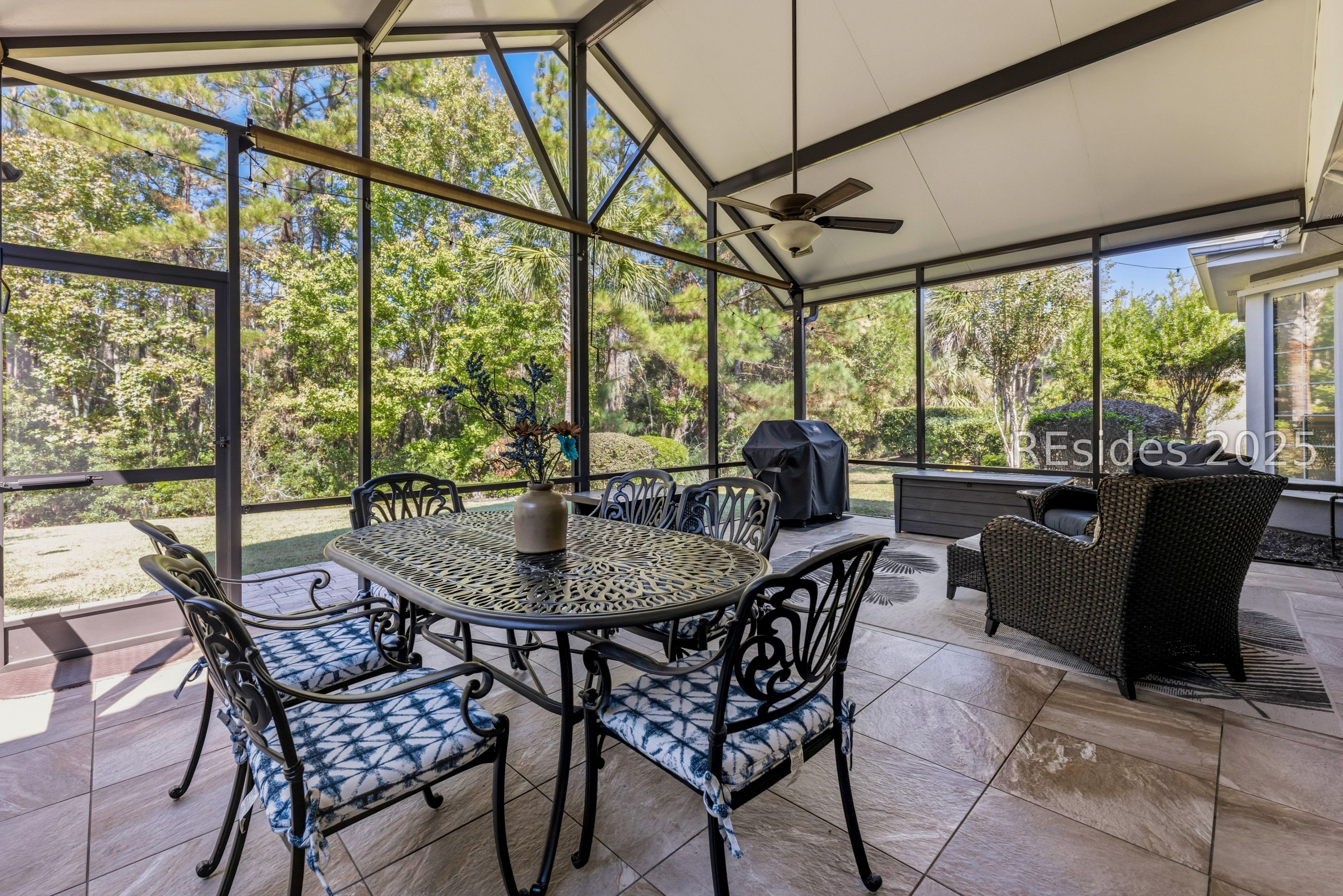 10 Fairforest Lane Bluffton, SC 29909 - Photo 3 of 46 Very large screened lanai with tile floors