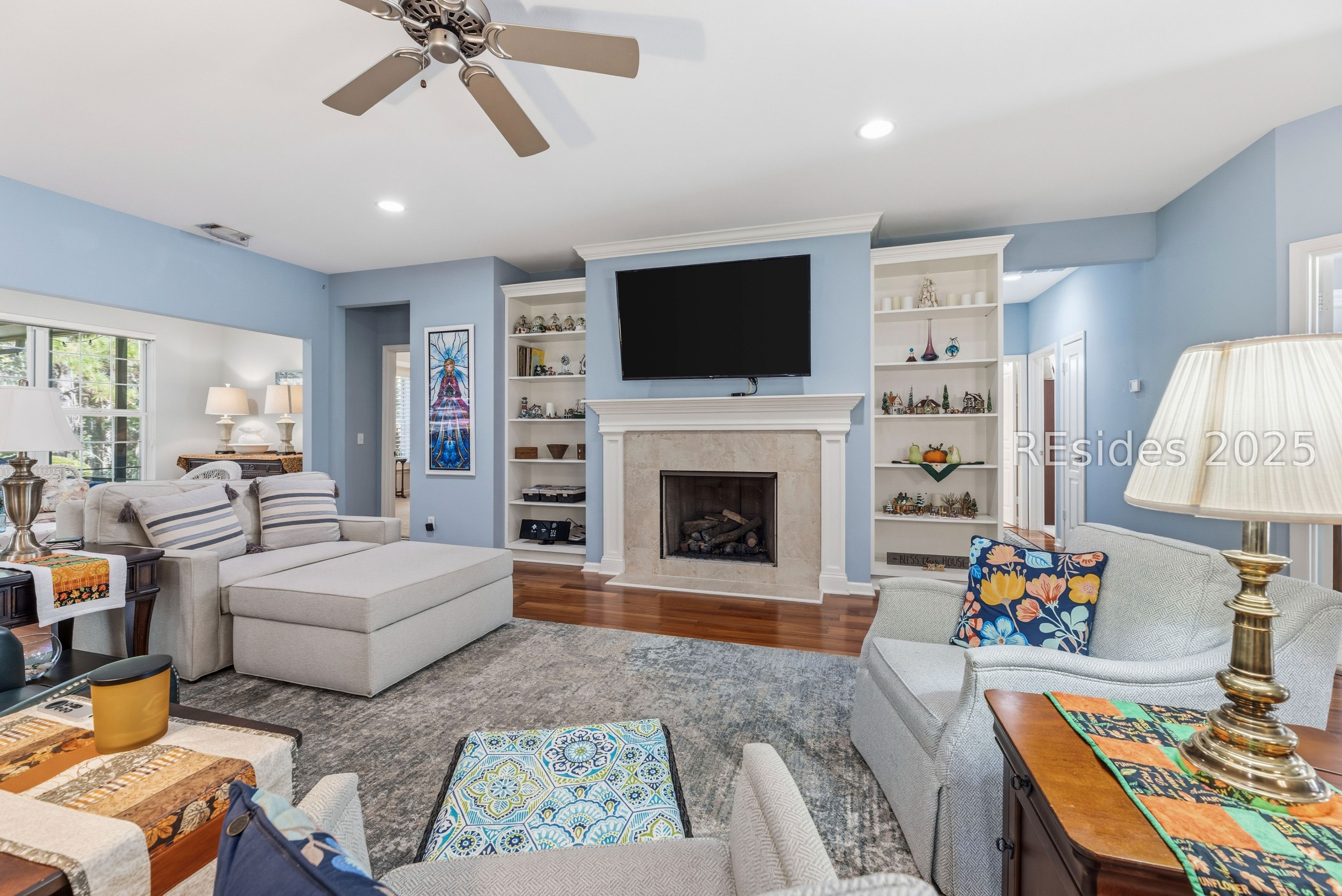 10 Fairforest Lane Bluffton, SC 29909 - Photo 10 of 46 Living area with built ins and gas fireplace