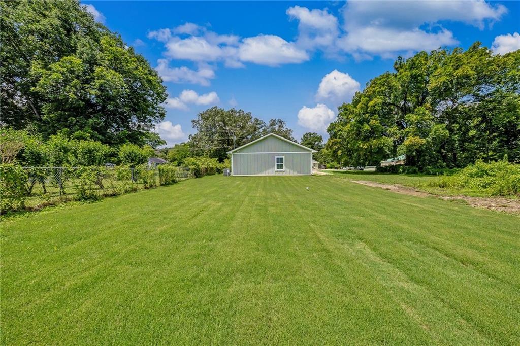 411 Hardy Avenue Southwest Rome, GA 30161 - Photo 25 of 27 a view of a house with a yard