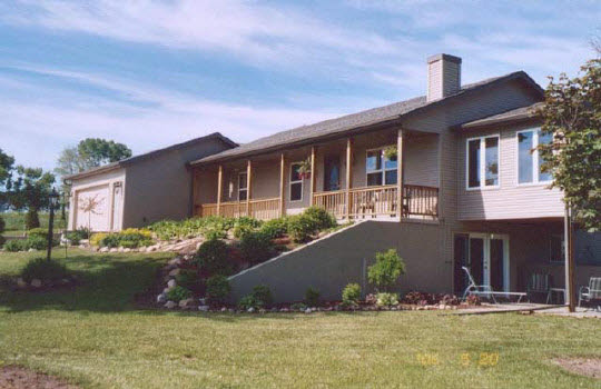 a front view of house with yard