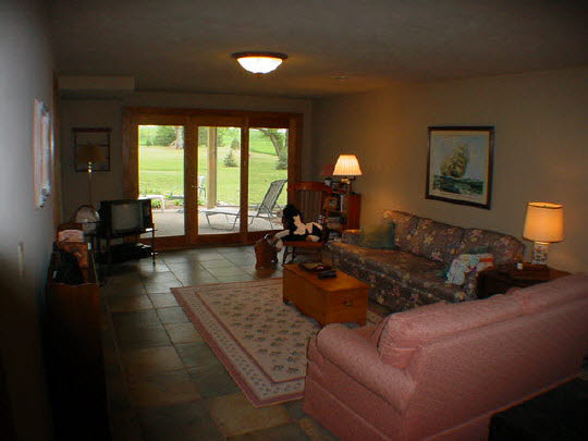 402 South Bolen Road Pecatonica, IL 61063 - Photo 5 of 6 a living room with furniture and a large window