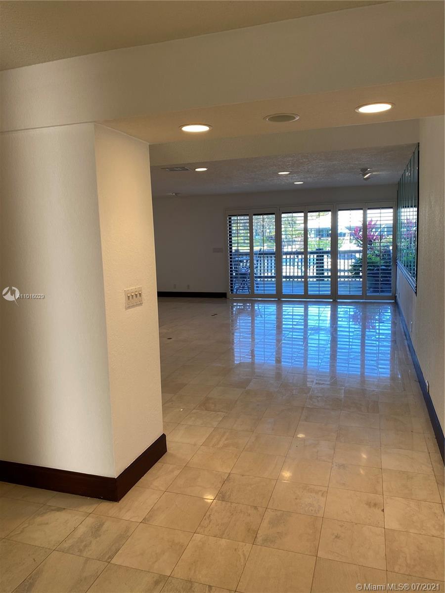 5278 Boca Marina Circle South Boca Raton, FL 33487 - Photo 2 of 37 a view of a hall with an entryway