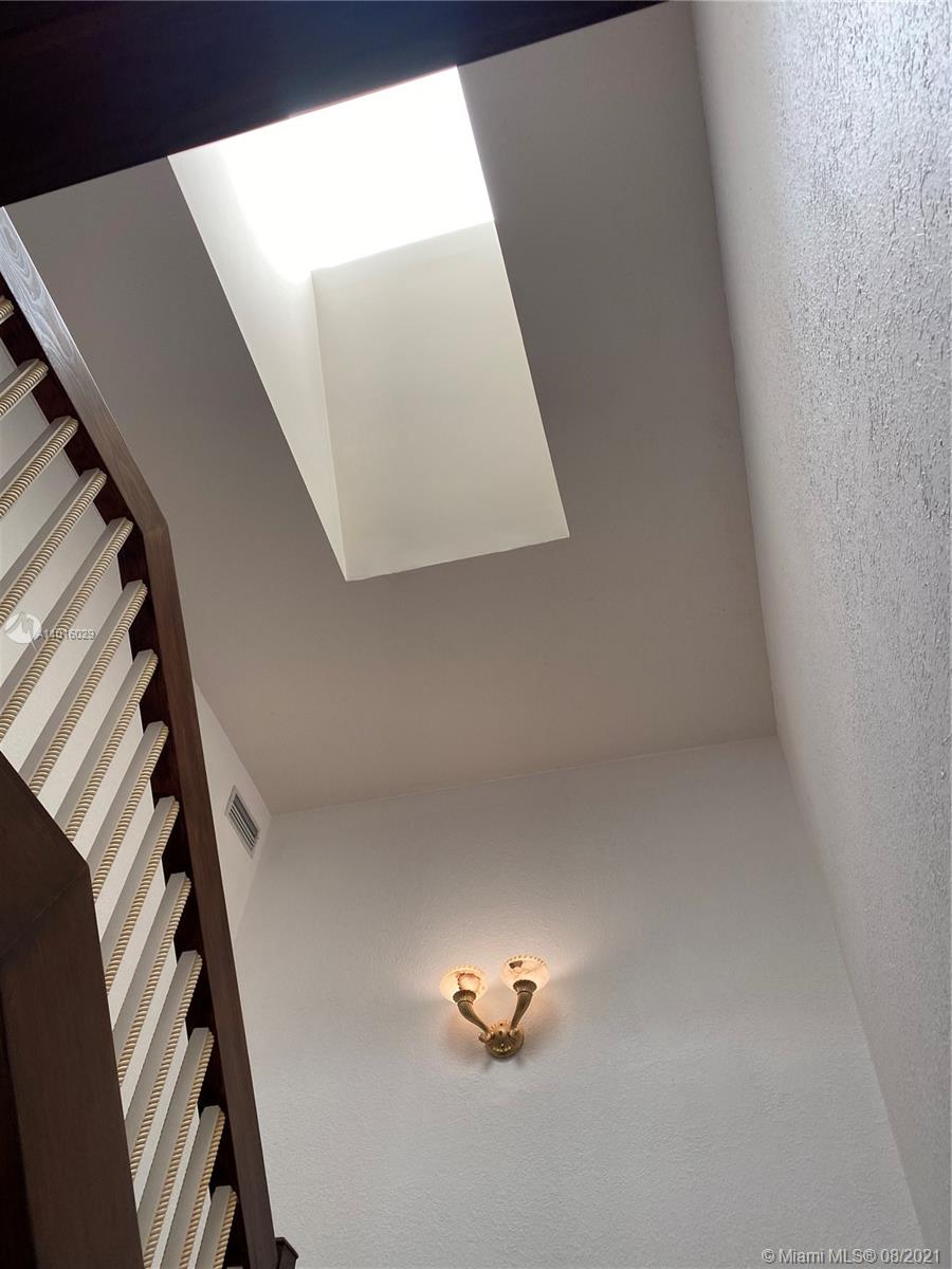 5278 Boca Marina Circle South Boca Raton, FL 33487 - Photo 12 of 37 a view of staircase with white walls