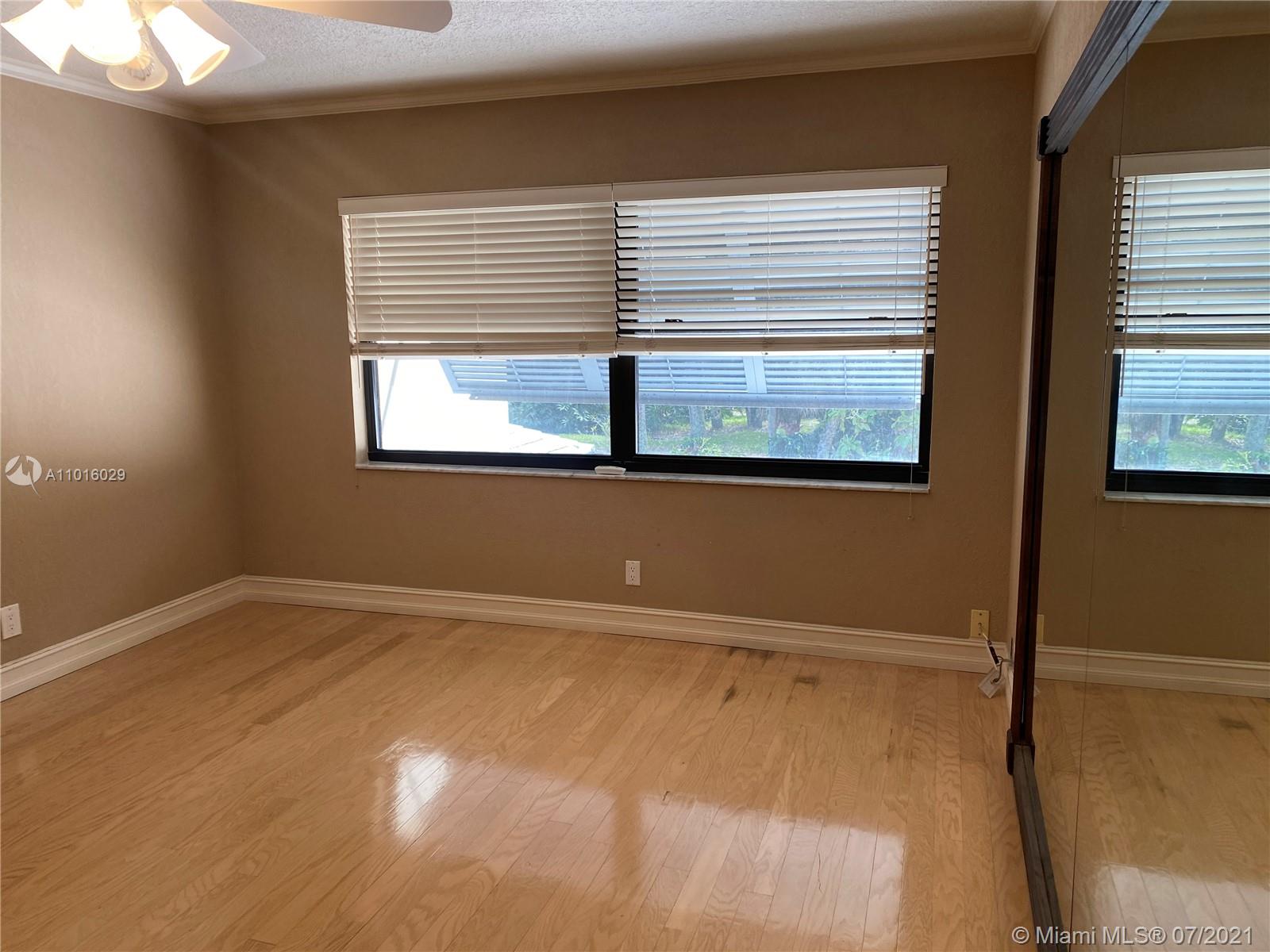 5278 Boca Marina Circle South Boca Raton, FL 33487 - Photo 16 of 37 a view of a window in an empty room