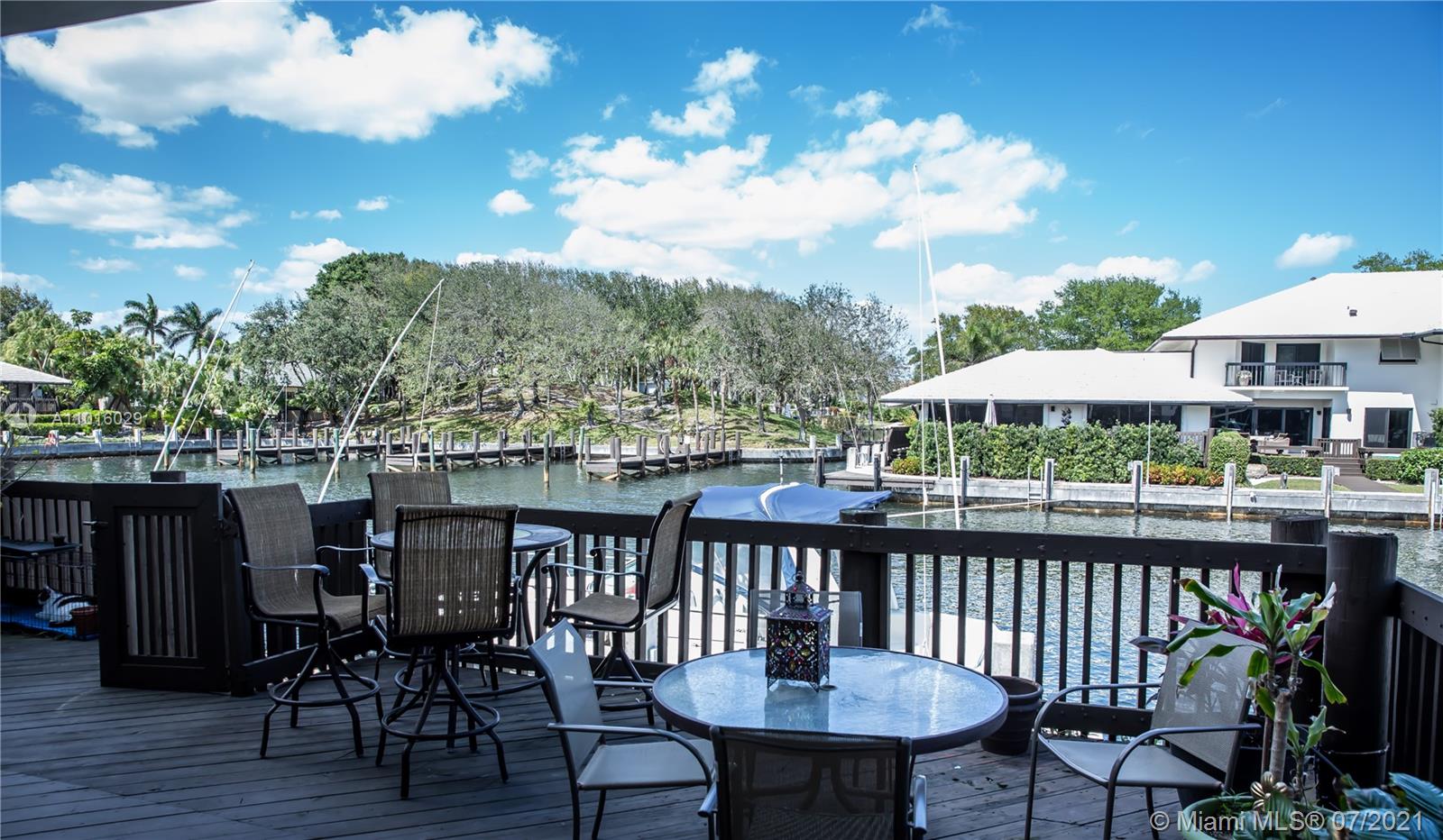 5278 Boca Marina Circle South Boca Raton, FL 33487 - Photo 22 of 37 an outdoor view of a house having patio