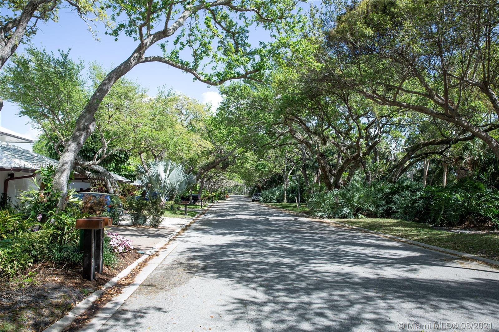 5278 Boca Marina Circle South Boca Raton, FL 33487 - Photo 24 of 37 a view of a street with a trees