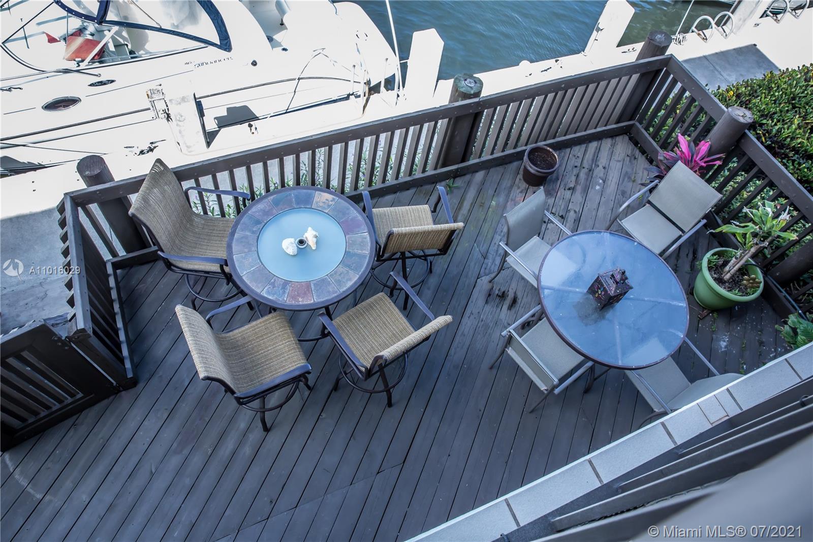 5278 Boca Marina Circle South Boca Raton, FL 33487 - Photo 27 of 37 a view of a deck with furniture