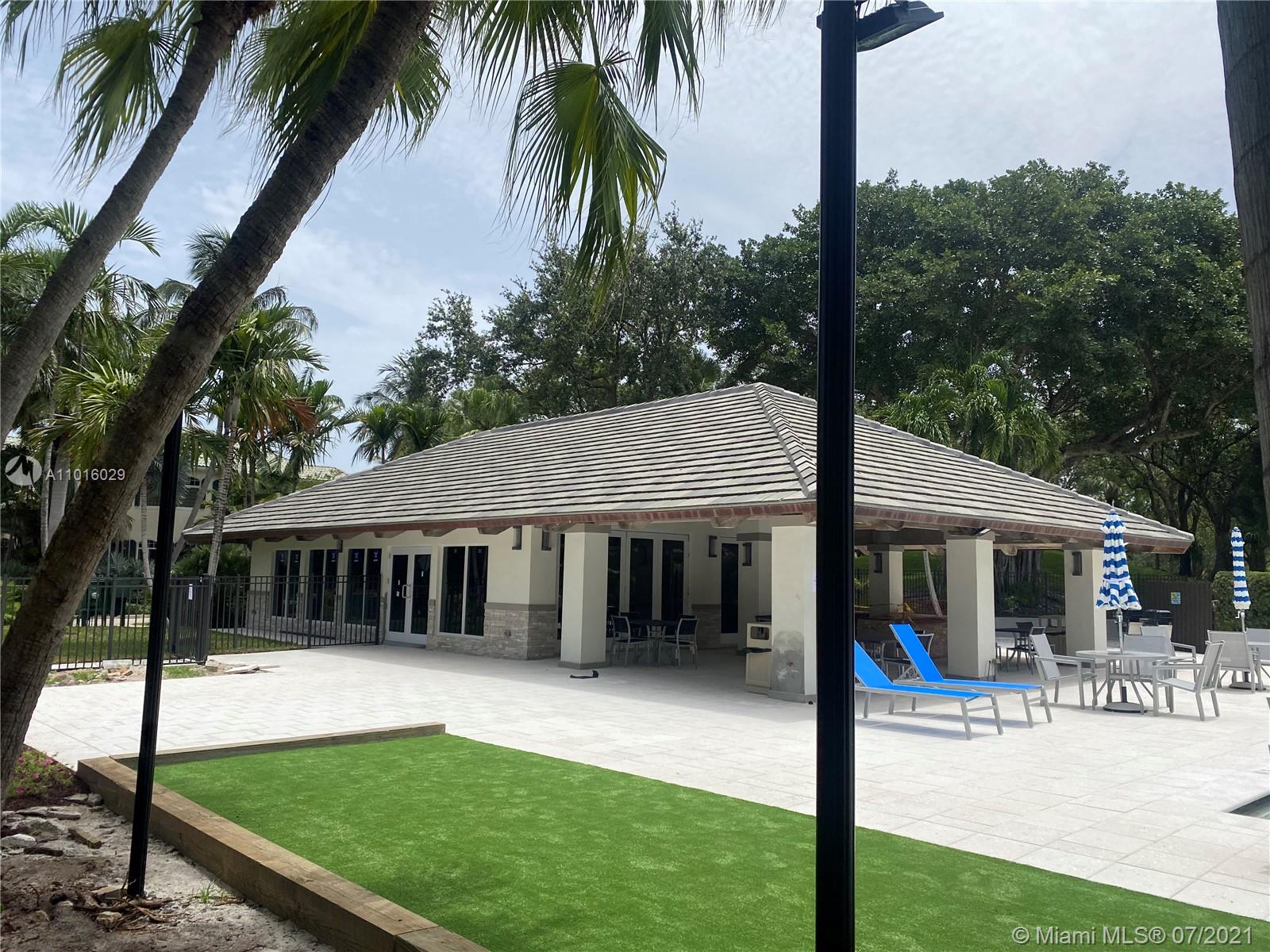 5278 Boca Marina Circle South Boca Raton, FL 33487 - Photo 37 of 37 a front view of a house with garden