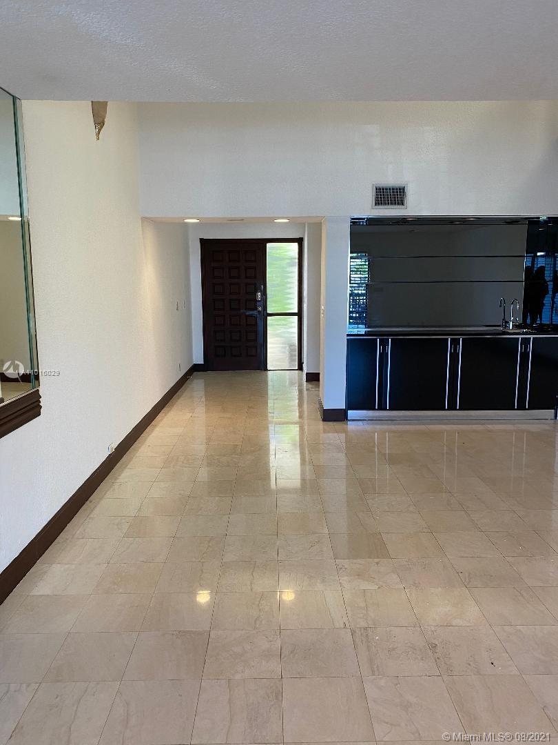 5278 Boca Marina Circle South Boca Raton, FL 33487 - Photo 6 of 37 an empty room with windows
