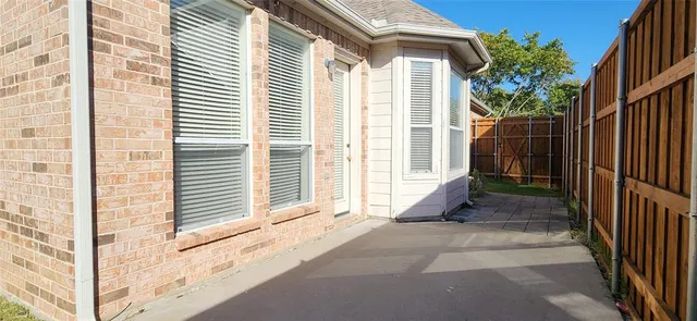 a view of backyard with a garden and staircase