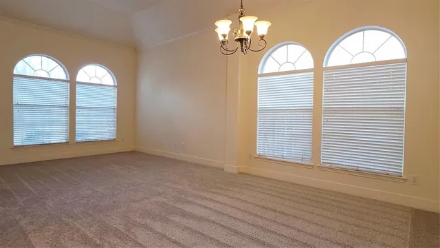 a view of a livingroom with wooden floor