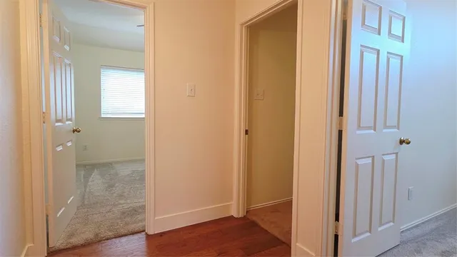 a view of a bathroom with a glass door
