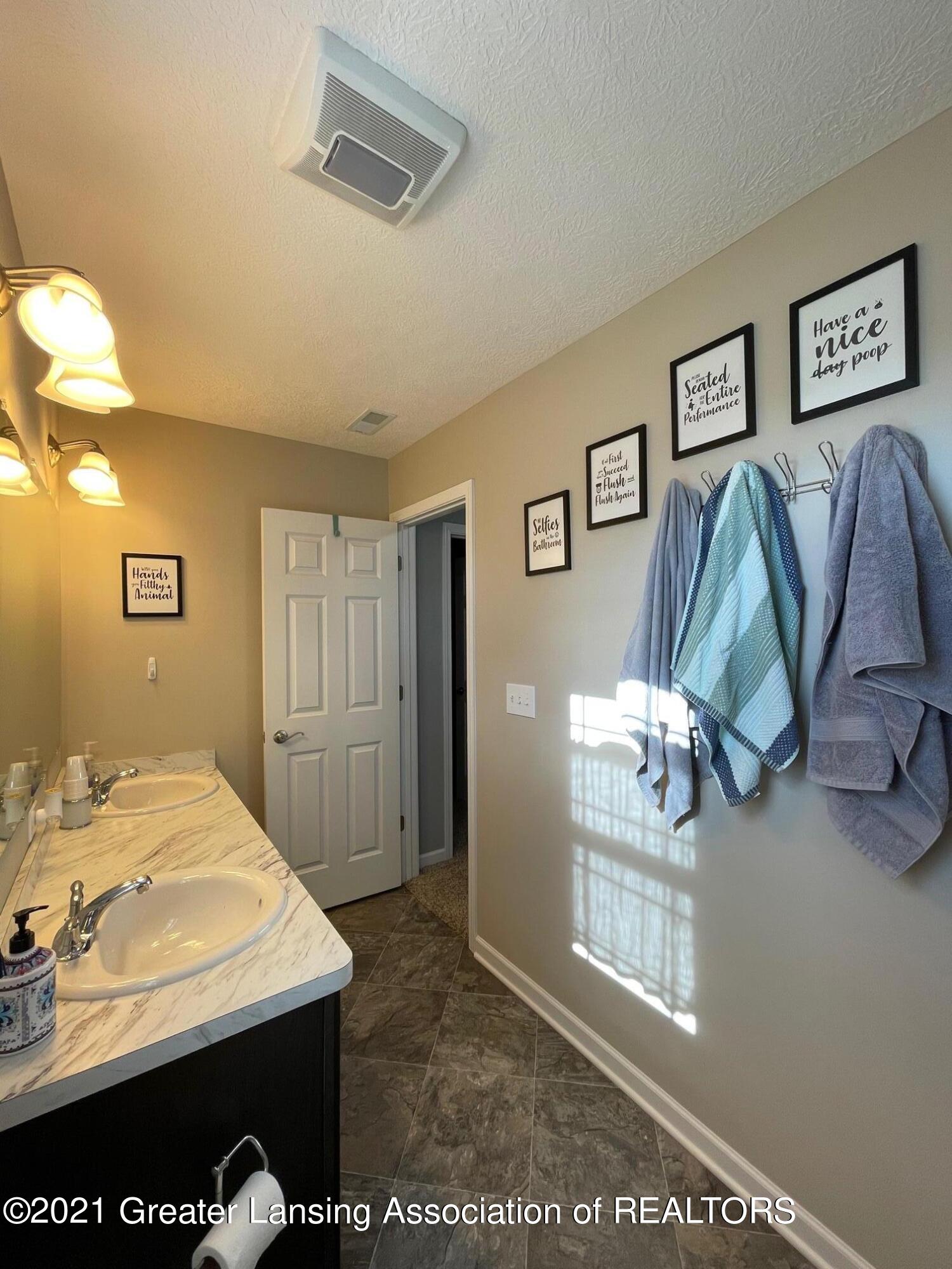 8740 Adkris Dimondale, MI 48821 - Photo 46 of 72 Second Full Double Sink Bath