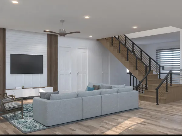 a living room with a large window and a wooden floor