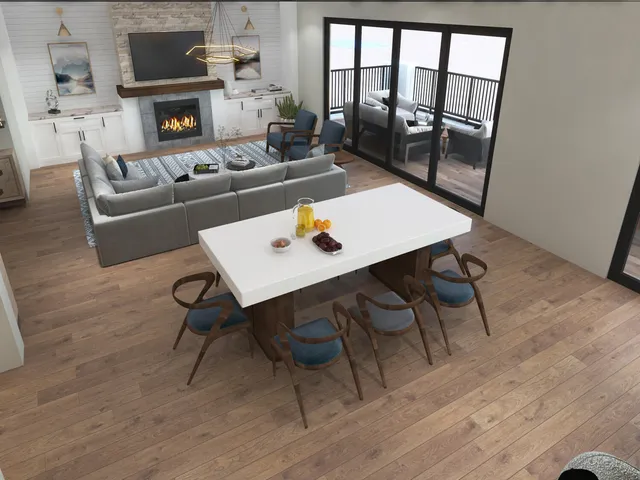 a bedroom with a bed a table and a dresser