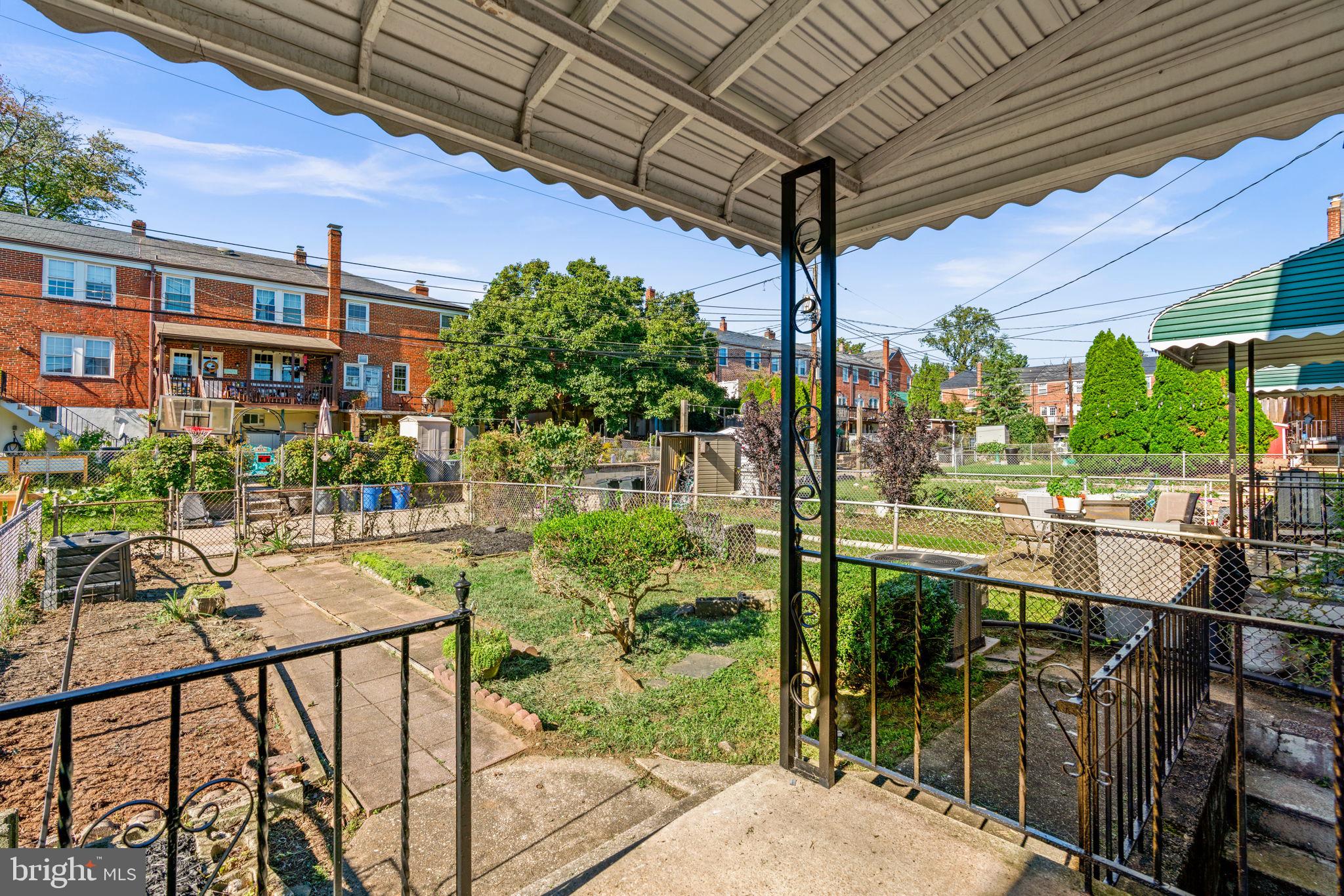 416 Stratford Road Baltimore, MD 21228 - Photo 26 of 44 Covered porch and plenty of space to garden
