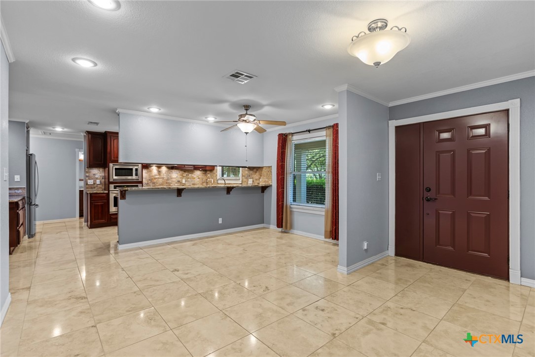 3745-3735 Canyon Heights Road Belton, TX 76513 - Photo 7 of 45 a view of kitchen cabinet and refrigerator