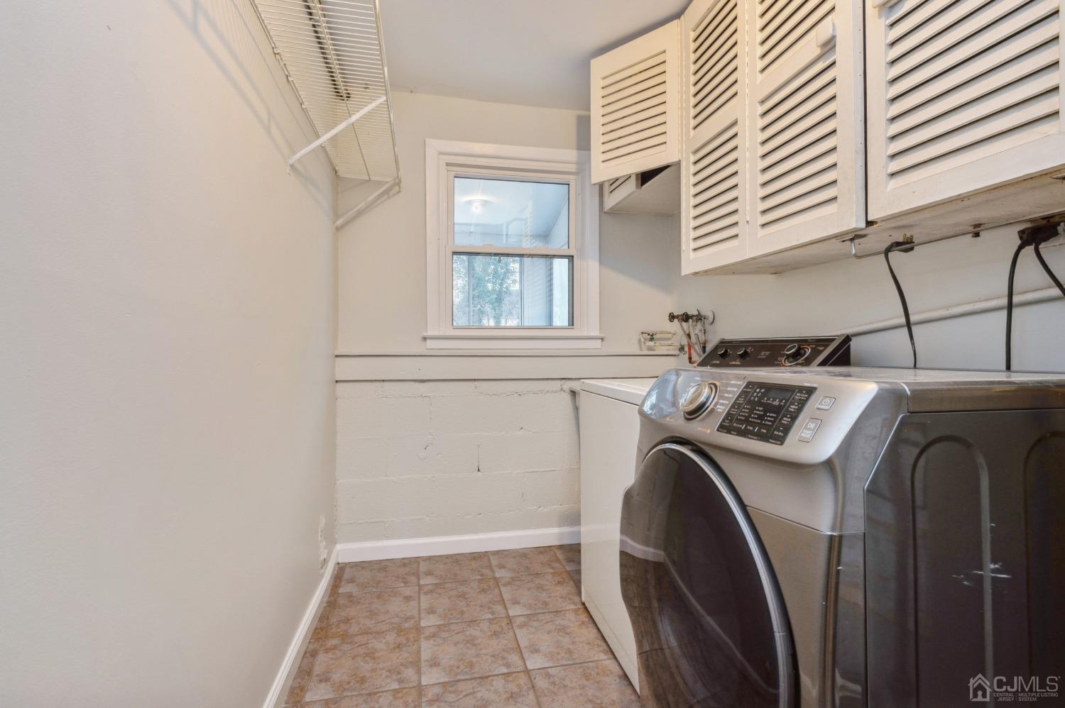 1 Bruce Road East Brunswick, NJ 08816 - Photo 18 of 21 a utility room with dryer and washer