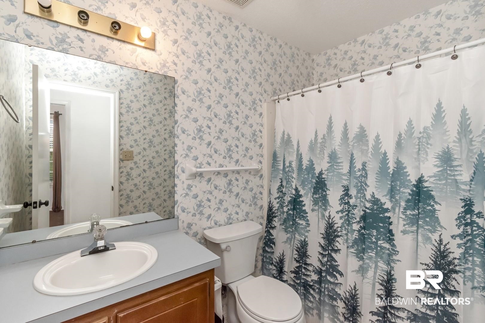 1345 Camden Court Mobile, AL 36695 - Photo 15 of 31 Full bathroom with vanity and a shower with shower curtain