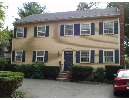 10 Lattimer Street, Unit 1 Marblehead, MA 01945 - Photo 1 of 1 a front view of a house with a yard