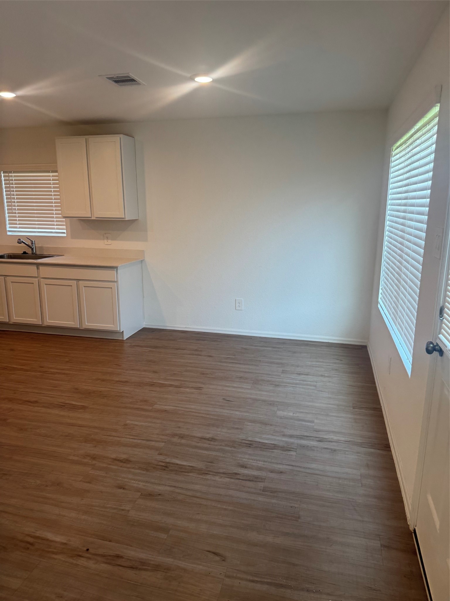 3202 Holly Stokes Way Conroe, TX 77301 - Photo 10 of 24 a view of room with window and wooden floor