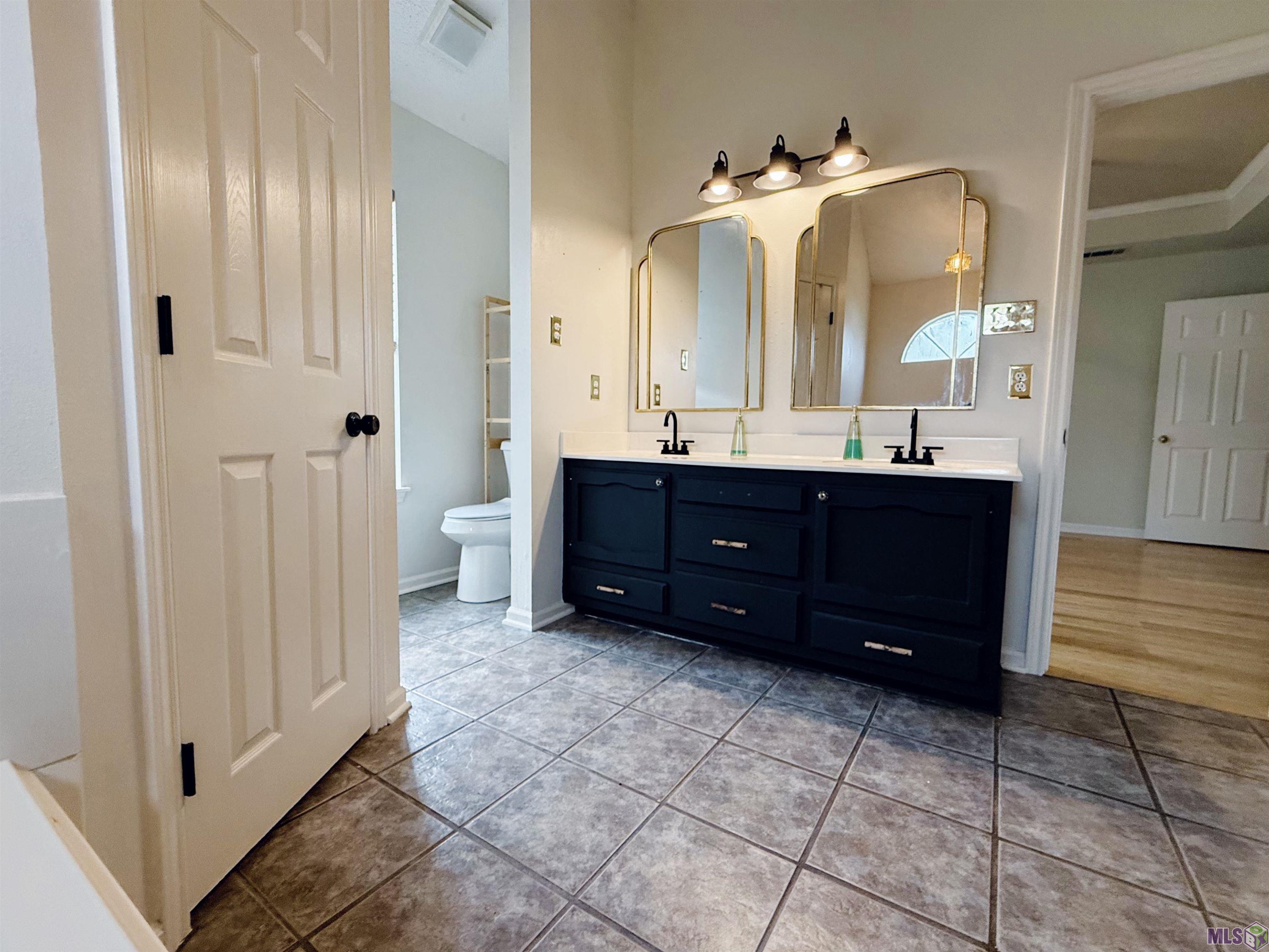 7605 Recorder Drive St. George, LA 70817 - Photo 25 of 44 UPDATED PRIMARY BATHROOM