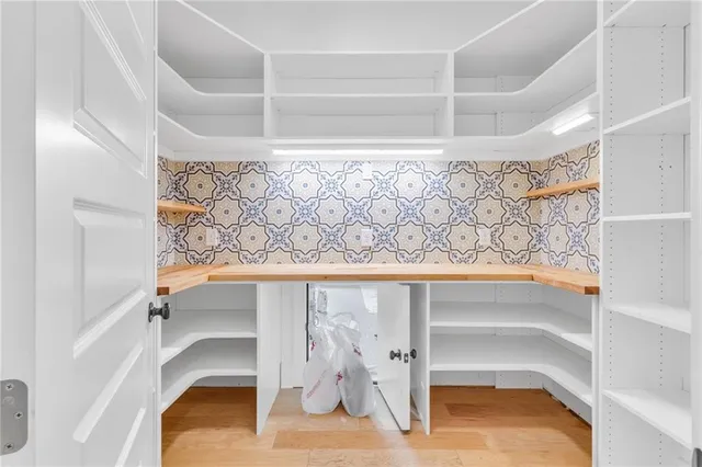 a view of yard with swimming pool and green space