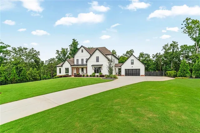 a front view of a house with a porch