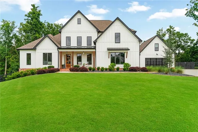 a view of living room with furniture and a window