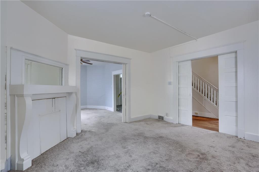 403 Federal Street Butler, PA 16001 - Photo 12 of 46 Two sets of pocket doors allow the space to become very intimate and private.