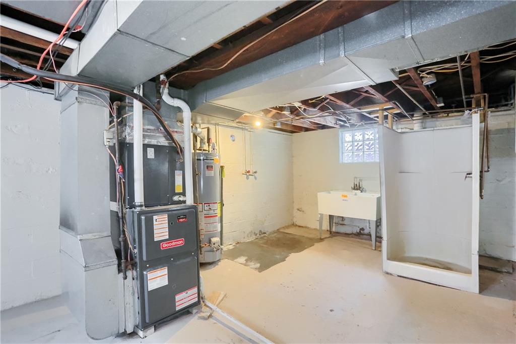403 Federal Street Butler, PA 16001 - Photo 39 of 46 A laundry sink and shower are available in the lower level and have potential to be a great space with your vision.